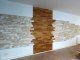 Realizace obkladu na stěně, která kombinuje dva druhy dřevěných lamel