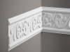 Nástenná lišta – S ORNAMENTOM, tvrdý plast ProFoam® (polyuretán), základný biely náter (pretierateľný), 128 x 14 x 2000 mm