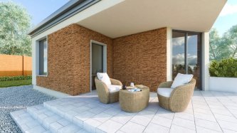 Realizace betonového obkladu CALIFORNIA 3 – Hnědá imitace kamene na domě