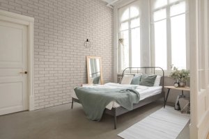 Realizace betonového obkladu BOSTON 3 na stěně pokoje
