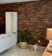 Realizace dřevěného obkladu z ořechových 3D lamel v obýváku